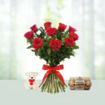 Send 10 Red Roses Flowers Bouquet And Teddy with Ferroro Rocher Gift Online in India