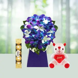 Send 12 Blue Orchids Flowers Bouquet with Teddy And Ferrero Rocher Gift Online in India