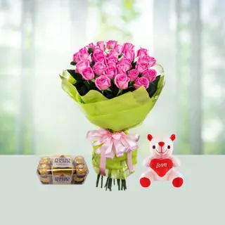 Send 12 Pink Roses Flowers Bouquetswith Ferroro rocher Chocolates And Teddy Gift Online in India