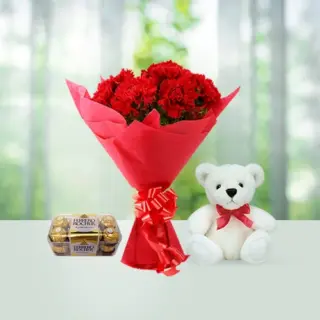 Send 12 Red Carnations Flower Bouquet with Ferroro Rocher Chocolates with Teddy Gift Online in India