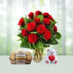 Send 12 Red Roses Flowers Bouquet with Ferrero Rocher Chocolates And Teddy Gift Online in India