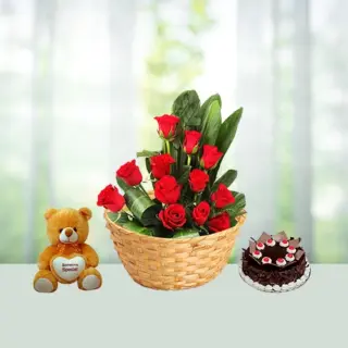 Send 12 Red Roses Flowers Bouquet with Teddy And Half Kg Black Forest Cake Gift Online in India