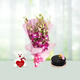 Send 6 Purple Orchid Flowers Bouquet with Half Kg Chocolate Cake and Teddy Gift Online in India