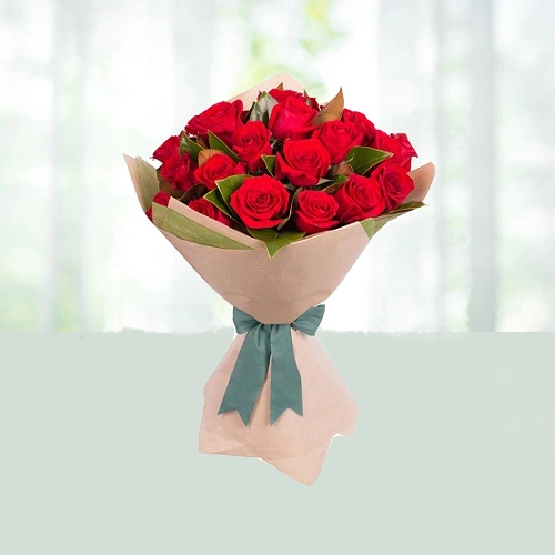 7-bouquet-12-red-roses-in-a-paper-packaging-flowershopindia